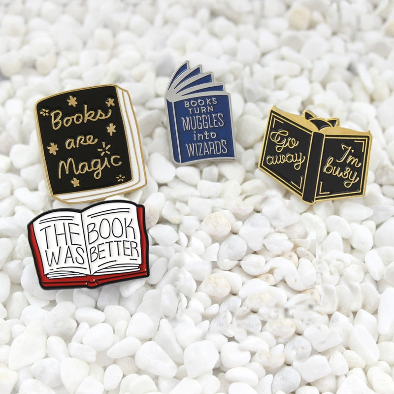 Various "Book" pins.  Brooch
