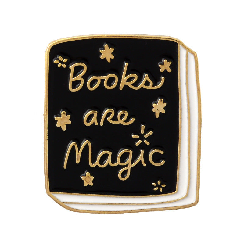 Various "Book" pins.  Brooch