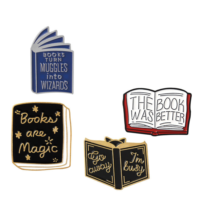 Various "Book" pins.  Brooch